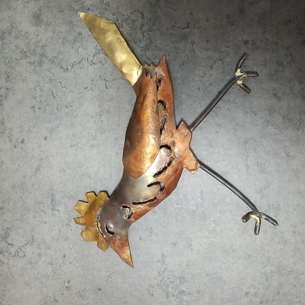 Unique metal bird for wall display. Copper, gold, gun metal colours